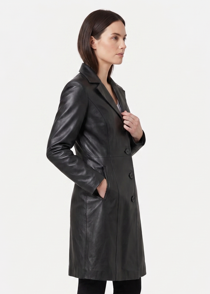 Woman wearing a black leather coat on a white background